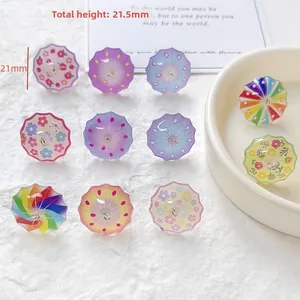 Detailed close-up of colorful resin mini umbrella charms for DIY jewelry making and crafts