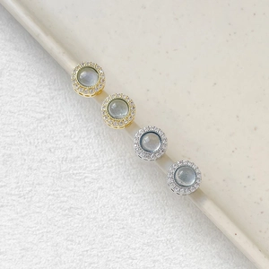 Gold and silver plated round beads with aquamarine blue zircon and micro-pave crystals