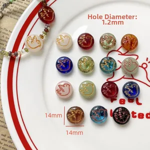 Detailed macro view of 14mm bird glass beads for DIY jewelry with 1.2mm hole size
