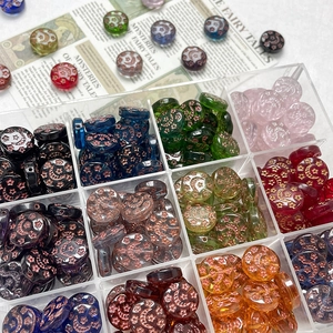 Hand-painted vintage sun moon and star pattern glass bead set in a transparent storage box