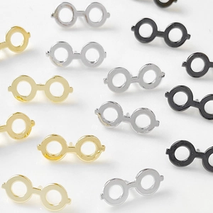 Gold, silver and black round frame eyewear stud earrings with metallic mirror finish