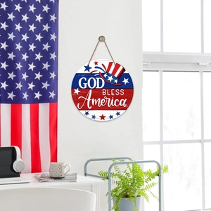 God Bless America wooden welcome sign with patriotic stars and hat on white wall