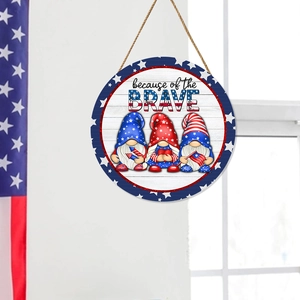 Patriotic gnome welcome door sign with American flag design and because of the BRAVE text