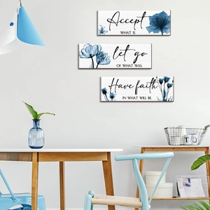 Floral wall art set with blue X-ray flower prints and inspirational quotes on white wood