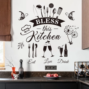 Self-adhesive black PVC wall sticker with Bless this Kitchen text and cutlery patterns