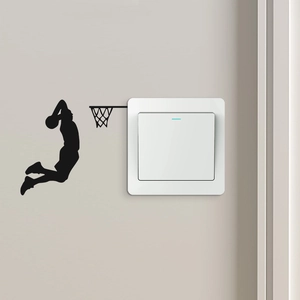 Detailed view of basketball slam dunk silhouette wall sticker around a light switch