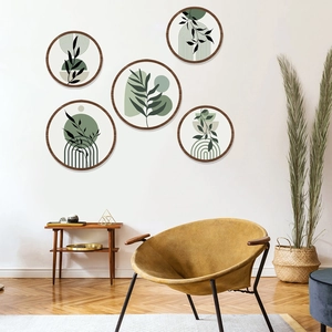 5-piece round bohemian wooden wall art set with green botanical and geometric patterns