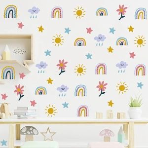 Bohemian style rainbow and sun wall decals set in soft pastel colors for nursery decor