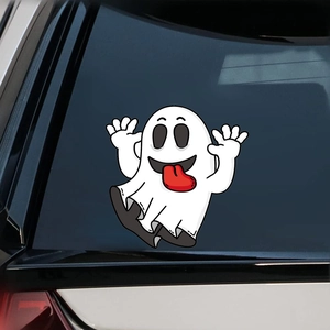 Detail view of a waterproof PVC ghost sticker with a red tongue on a car rear window