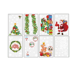 Set of 8 self-adhesive PVC Christmas wall stickers featuring Santa and festive tree designs