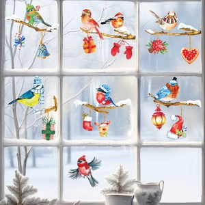 Festive Christmas window stickers with winter birds in hats and scarves on snowy branches