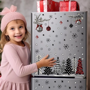 Christmas watercolor snowflake stickers and plaid tree decals on silver refrigerator
