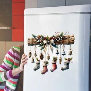 Christmas stocking and bells PVC wall stickers on white fridge in cozy home setting