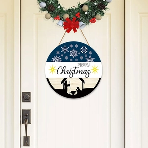 Christmas Nativity scene wooden door sign with Merry Christmas text on a white front door