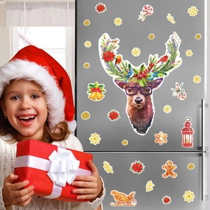Christmas reindeer wall stickers with snowflakes and festive elements on a fridge