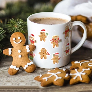 Christmas ceramic mug with gingerbread man stickers and festive holiday decorations