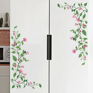Floral vine wall stickers with pink flowers and green leaves on white refrigerator