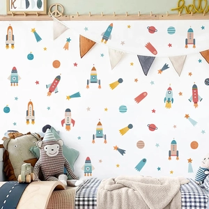Cartoon space wall stickers featuring rockets and planets for kids room nursery decor