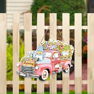 Spring gnome red truck wooden welcome sign hanging on a garden fence for home decor