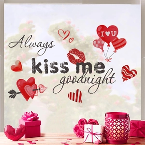 Valentine's Day window stickers with heart patterns and Always Kiss Me Goodnight lettering