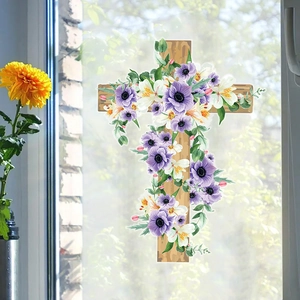 Detailed Easter cross window sticker with purple flowers on a bright glass background