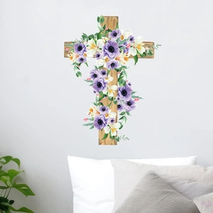 Easter cross wall decal with purple flowers and green leaves on a white wall
