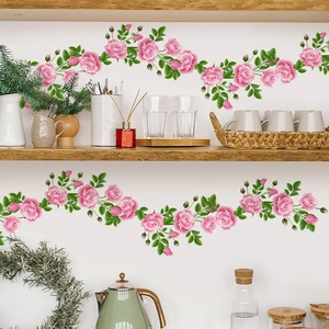 Floral wall stickers featuring pink rose clusters and green vines for home decoration