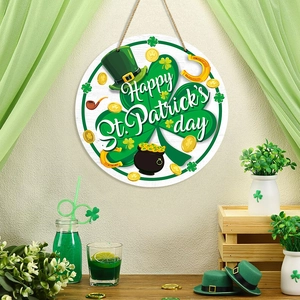 Round St. Patrick's Day wooden door sign with clovers, gold coins, and festive accessories