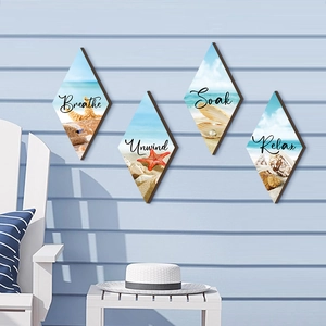 Set of four diamond wood beach signs with sea stars and words Relax Breathe Unwind