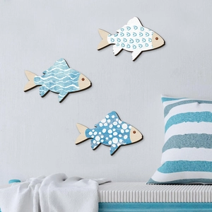 Set of 3 Nordic style wooden fish wall hangings with blue and white Mediterranean patterns