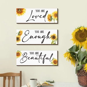 Three-piece sunflower wall art set with motivational quotes on rustic wooden plaques