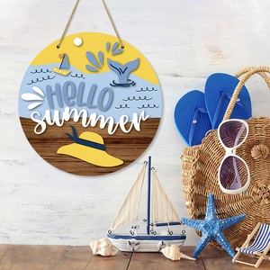 Detail of wooden Hello Summer sign with nautical illustrations and seaside decorations