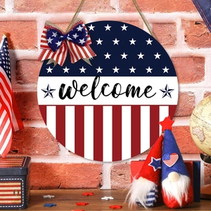 American Independence Day welcome sign with flag stars and stripes on red brick wall