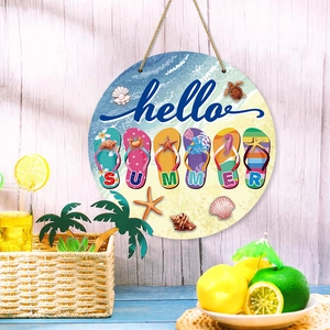 Round summer wooden welcome sign with colorful flip flops and blue Hello lettering