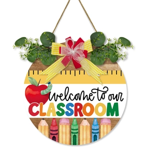 Welcome to our classroom round wooden door sign with school elements and green decor