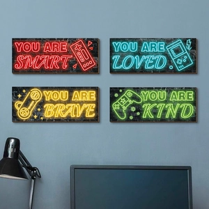 Neon style gaming wall art set with four motivational phrases on black brick texture