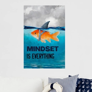 Modern wall art showing a gold fish with a shark fin and 'MINDSET IS EVERYTHING' quote