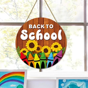 Round wooden Back to School welcome sign with colorful pencils and sunflower decor