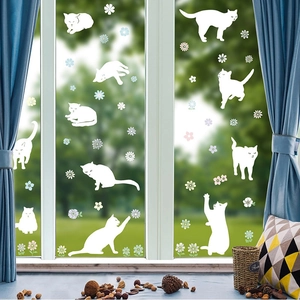 Bohemian black and white cat wall stickers with floral patterns on a glass window surface