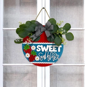Sweet Summer round wooden welcome sign with eucalyptus leaves and a black and white bow