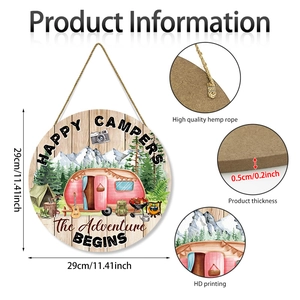 Detail of round wooden camping wall decor showing HD printing and hemp rope texture