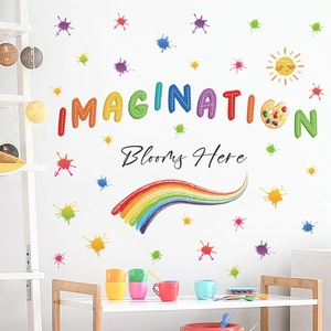 Detail of colorful rainbow and art palette wall decals with Imagination Blooms Here text