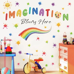 Detail of colorful imagination letters and rainbow wall decals in a creative playroom