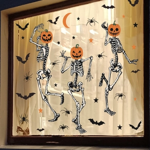 Halloween window stickers featuring skeletons with pumpkin heads, bats, and spiders