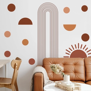 Detail view of boho geometric wall decals with sun and arch patterns in living room decor