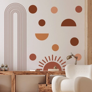 Detail of boho sun and arch wall decals in terracotta tones for a modern living room decor