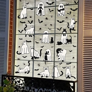 Cute Halloween window clings with white ghosts, black cats and bats on glass window