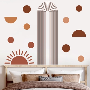 Detail of modern boho wall stickers with earth tone geometric sun and arch patterns