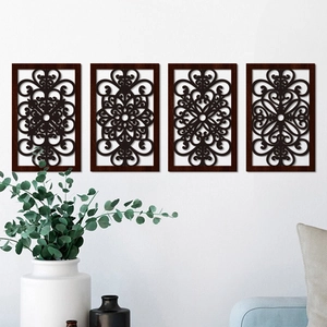 Set of 4 modern minimalist hollowed wood leaf wall hangings in deep brown finish