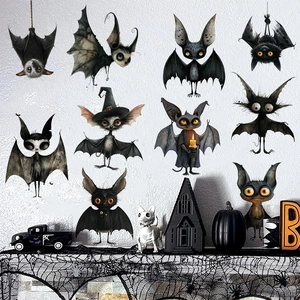 Set of spooky cartoon bat wall decals on a textured white wall for Halloween decor